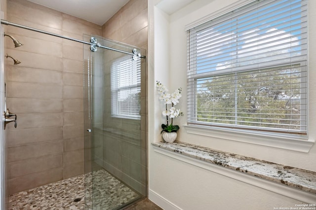 bathroom with a stall shower