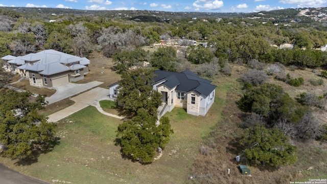 drone / aerial view with a forest view