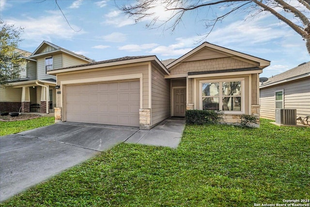 view of front of home with a garage, a front yard, and driveway