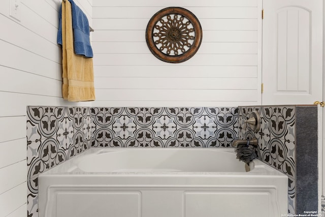 bathroom featuring a garden tub