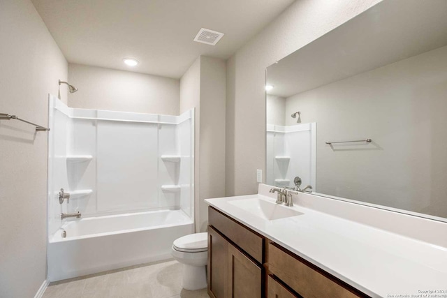 bathroom with shower / washtub combination, visible vents, toilet, vanity, and tile patterned flooring