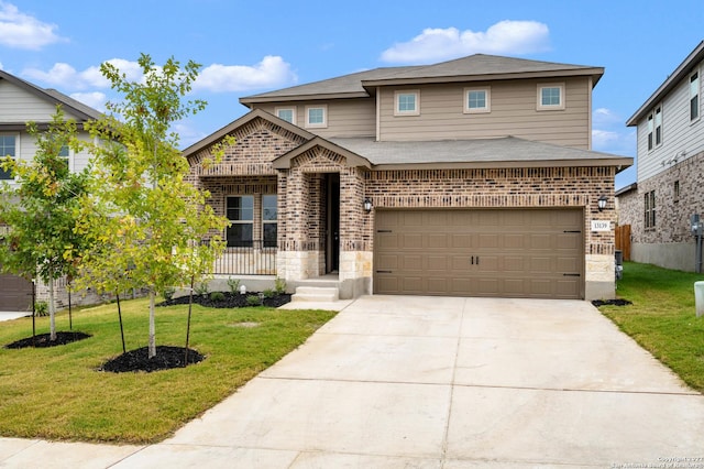 view of front of property with a shingled roof, brick siding, driveway, and a front lawn