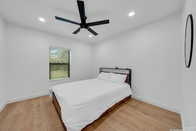 bedroom with recessed lighting, baseboards, ceiling fan, and light wood finished floors