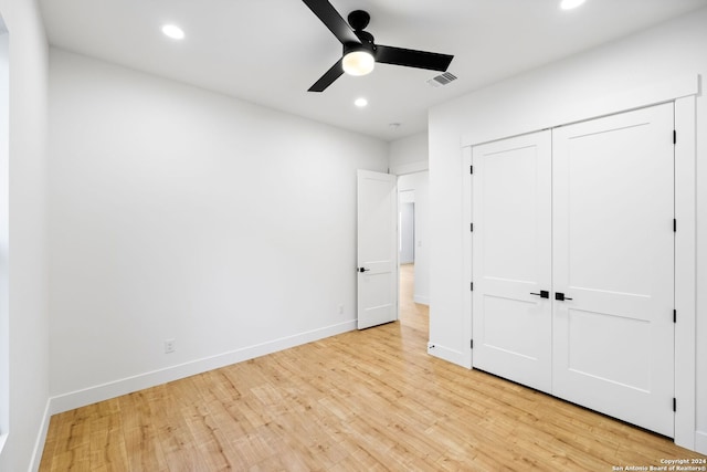 unfurnished bedroom with light wood-type flooring, baseboards, visible vents, and recessed lighting