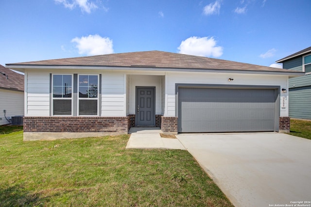 view of front of property with a garage, a front yard, concrete driveway, and brick siding