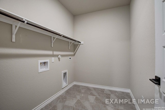 laundry area featuring washer hookup, hookup for a gas dryer, electric dryer hookup, laundry area, and baseboards