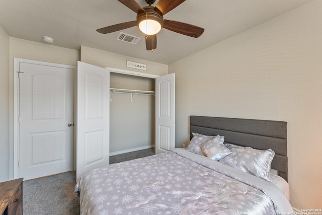 bedroom with carpet floors, a closet, visible vents, and a ceiling fan