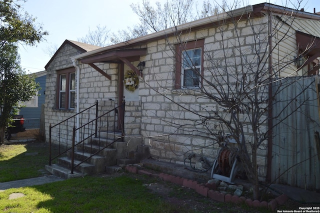 view of front of property featuring stone siding