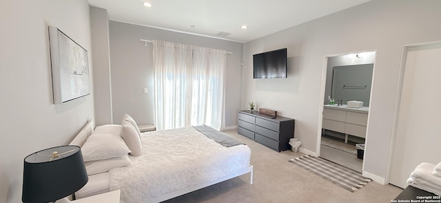 bedroom with visible vents, baseboards, connected bathroom, light colored carpet, and recessed lighting