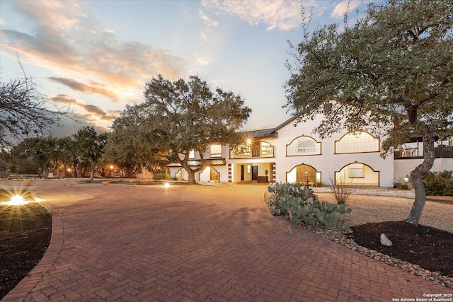 mediterranean / spanish-style house featuring stucco siding