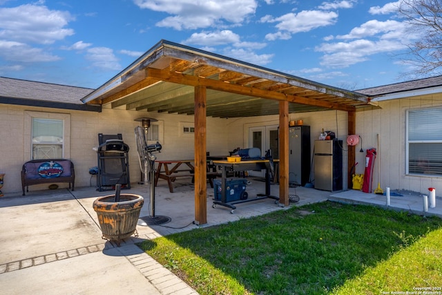 view of patio / terrace with french doors and a grill