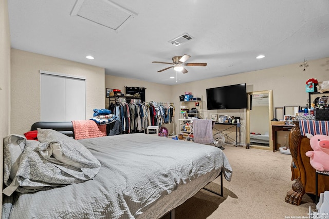 bedroom with visible vents, recessed lighting, carpet flooring, attic access, and ceiling fan