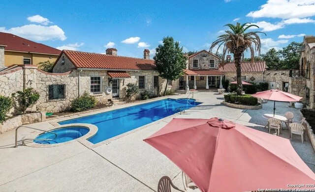 6160 Eckhert Unit 1202, San Antonio, TX 78240 - view of pool with a pool with connected hot tub and a patio
