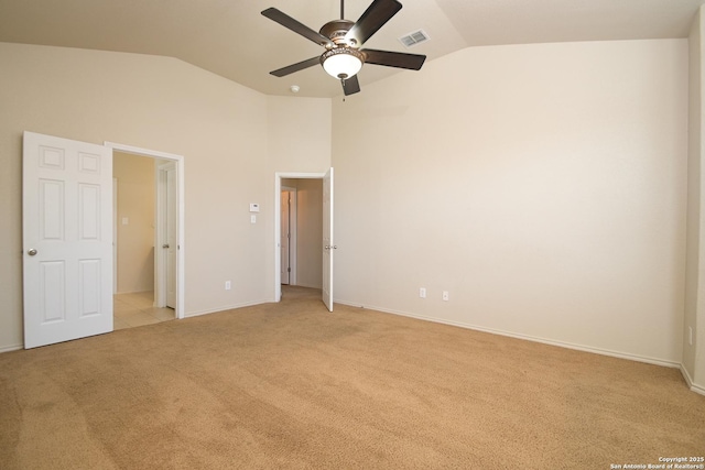 unfurnished bedroom featuring baseboards, a ceiling fan, visible vents, and light colored carpet