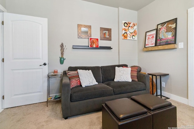 carpeted living room with baseboards