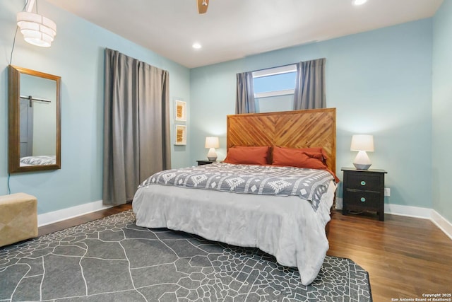 bedroom with a ceiling fan, baseboards, wood finished floors, and recessed lighting