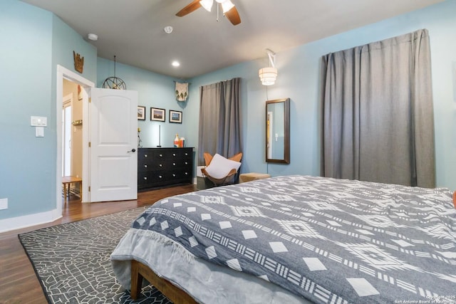 bedroom featuring ceiling fan, recessed lighting, wood finished floors, and baseboards