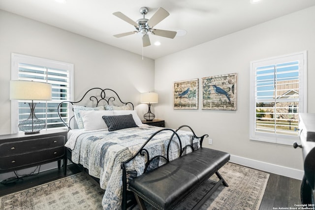 bedroom featuring ceiling fan, baseboards, wood finished floors, and recessed lighting