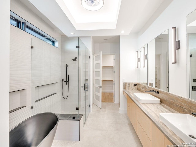 116 Chama Dr, Boerne, TX 78006 - bathroom featuring a shower stall, recessed lighting, a freestanding bath, and a sink