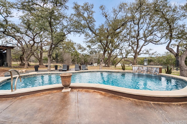 outdoor pool with a patio