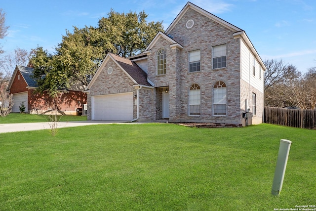 traditional-style home featuring a garage, brick siding, fence, concrete driveway, and a front yard