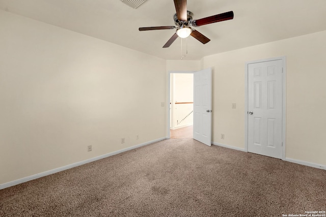 unfurnished bedroom featuring visible vents, carpet flooring, a ceiling fan, and baseboards