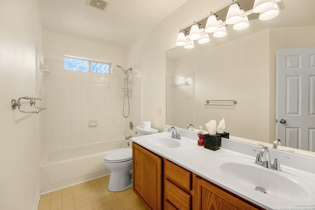 full bathroom with toilet, visible vents, a sink, and shower / bathing tub combination