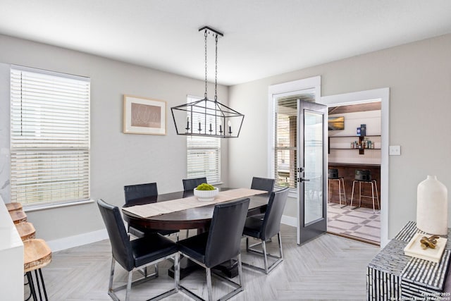 dining room with baseboards