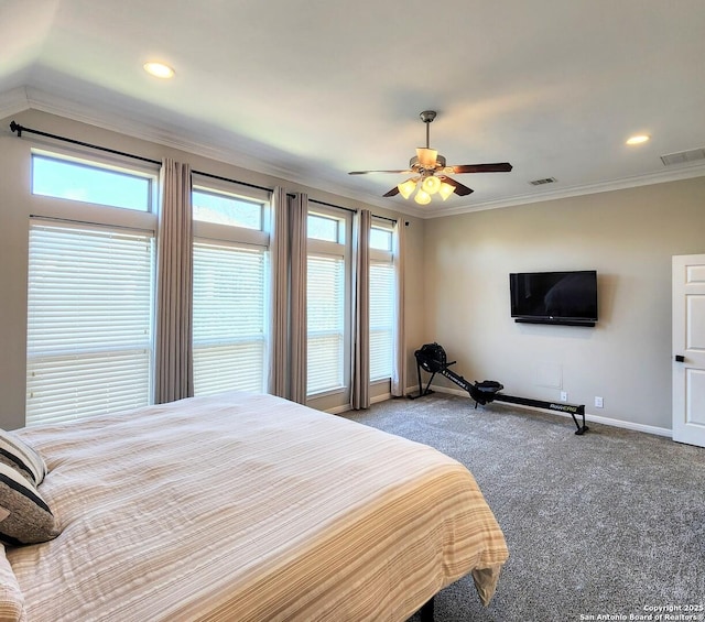 bedroom featuring ornamental molding, multiple windows, carpet flooring, and visible vents