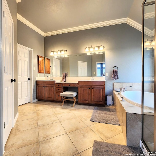 bathroom with double vanity, crown molding, a sink, and tile patterned floors