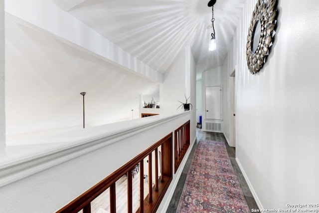 corridor with visible vents and baseboards