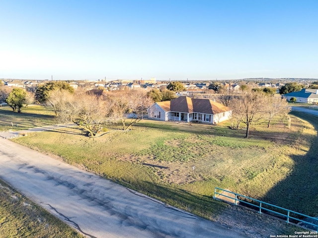 birds eye view of property featuring a rural view