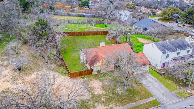 birds eye view of property with a residential view