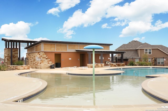 10220 High Noon, San Antonio, TX 78254 - community pool with fence and a patio area