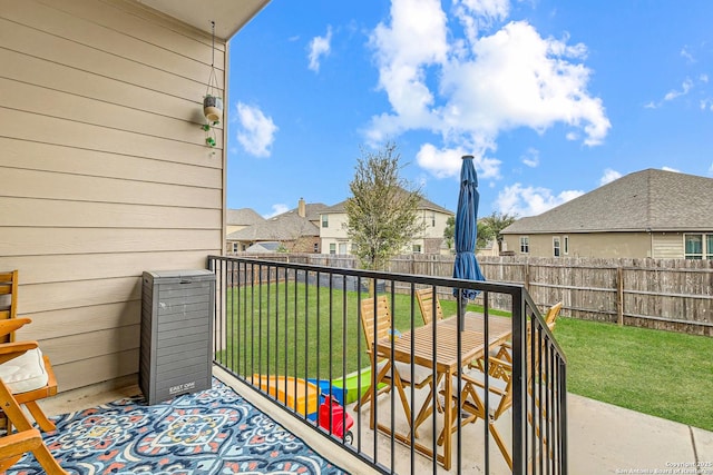 balcony featuring a residential view