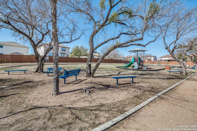 community playground featuring fence