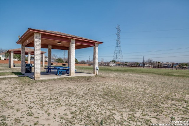 surrounding community featuring a patio and a gazebo