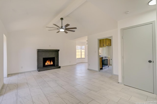 unfurnished living room with lofted ceiling with beams, a brick fireplace, ceiling fan, and baseboards