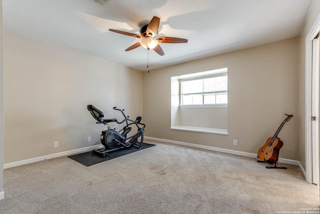 workout room with carpet flooring, ceiling fan, and baseboards