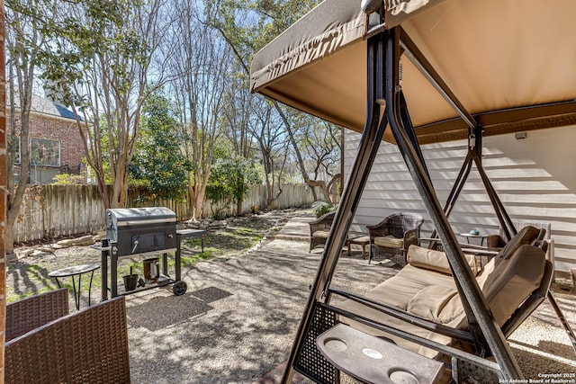 view of patio with fence