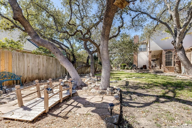 view of yard featuring fence