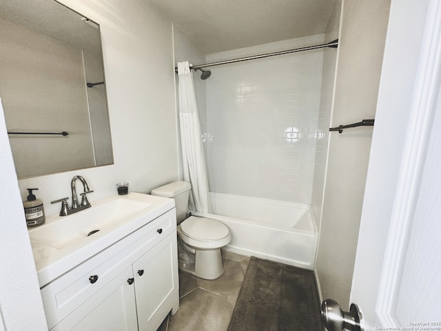 bathroom featuring toilet, shower / bath combo with shower curtain, and vanity