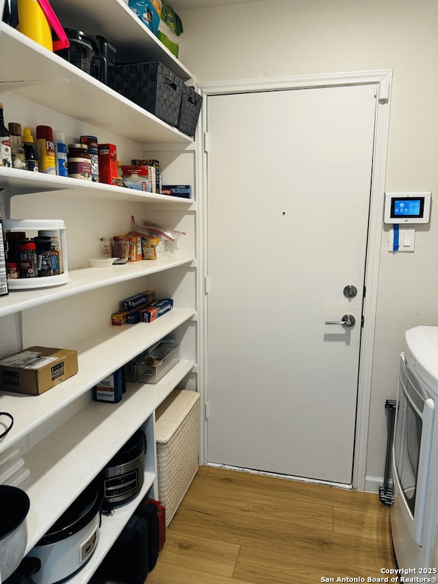 pantry featuring washing machine and dryer