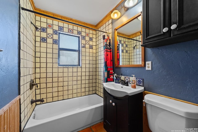 full bathroom with shower / bath combination, a textured wall, toilet, vanity, and tile patterned floors