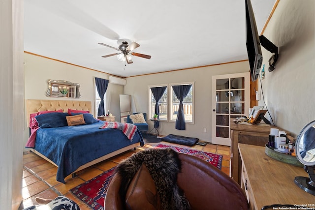 tiled bedroom featuring a wall unit AC, ceiling fan, and ornamental molding