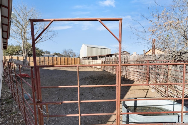 view of yard with an exterior structure and an outdoor structure