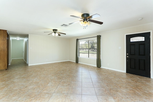 entryway with visible vents, ceiling fan, baseboards, and light tile patterned floors