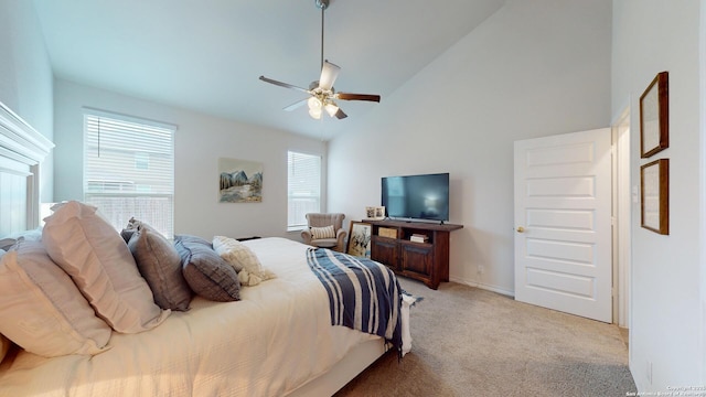 bedroom with high vaulted ceiling, light colored carpet, and ceiling fan