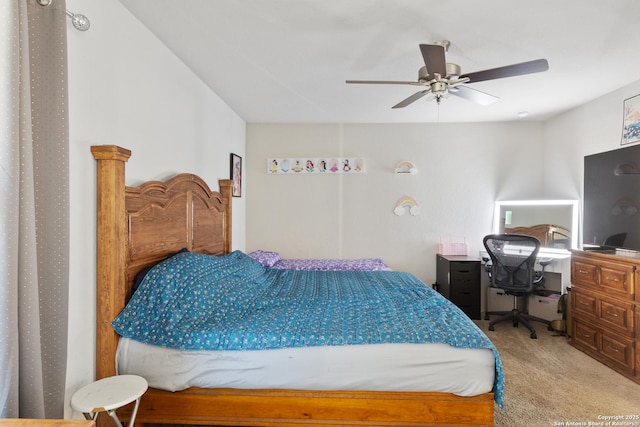 carpeted bedroom with a ceiling fan