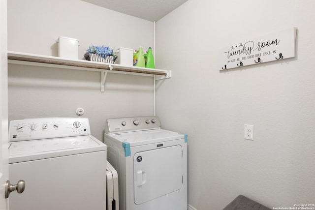 laundry room with laundry area and separate washer and dryer